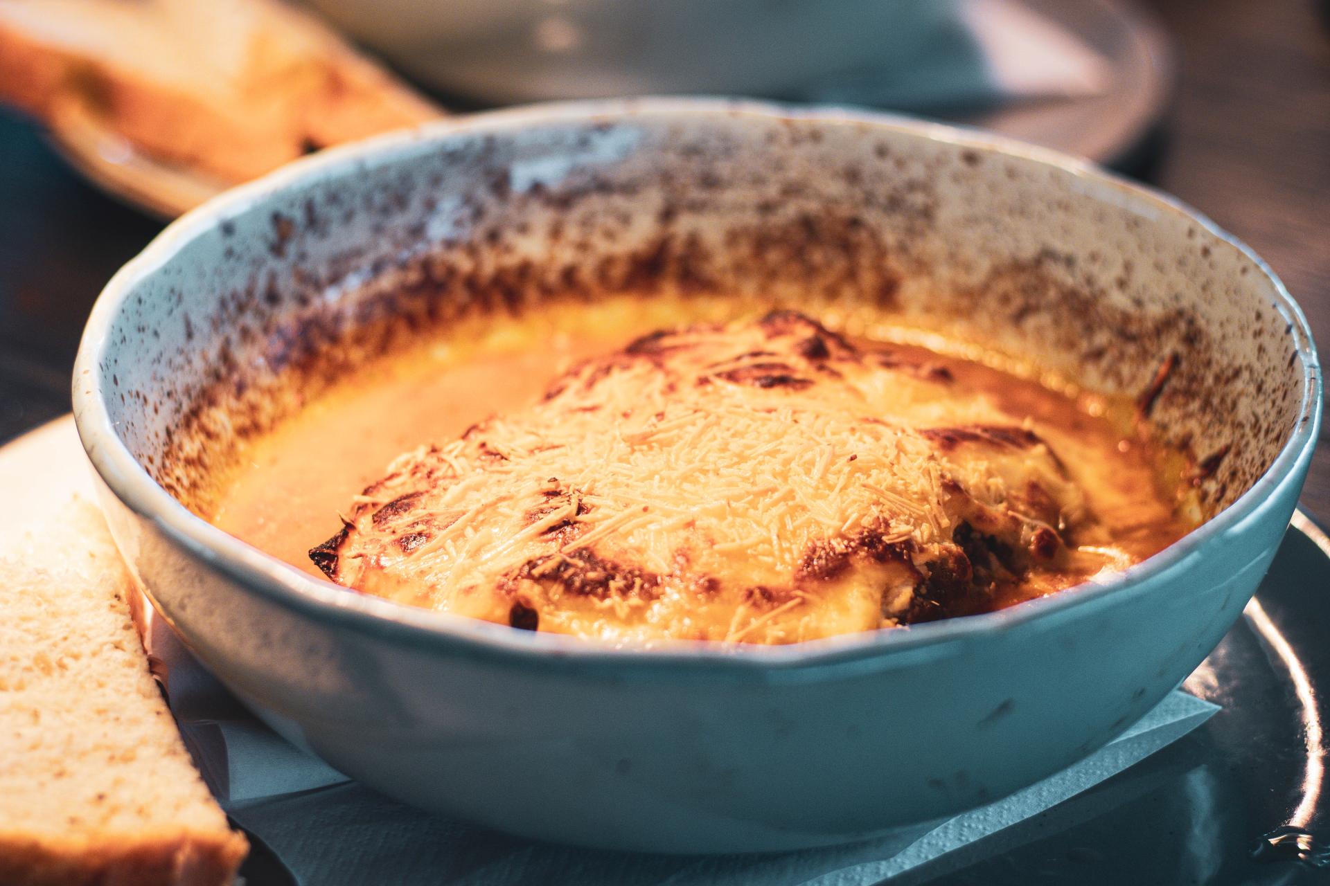 Lasgña bolognesa y ricota